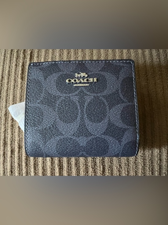 Coach Handbags - Coach Snap Wallet
In Signature Canvas NWT w/packaging